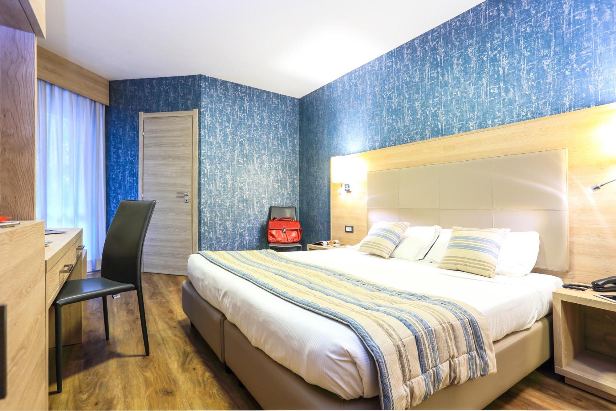 Dreibettzimmer mit Balkon