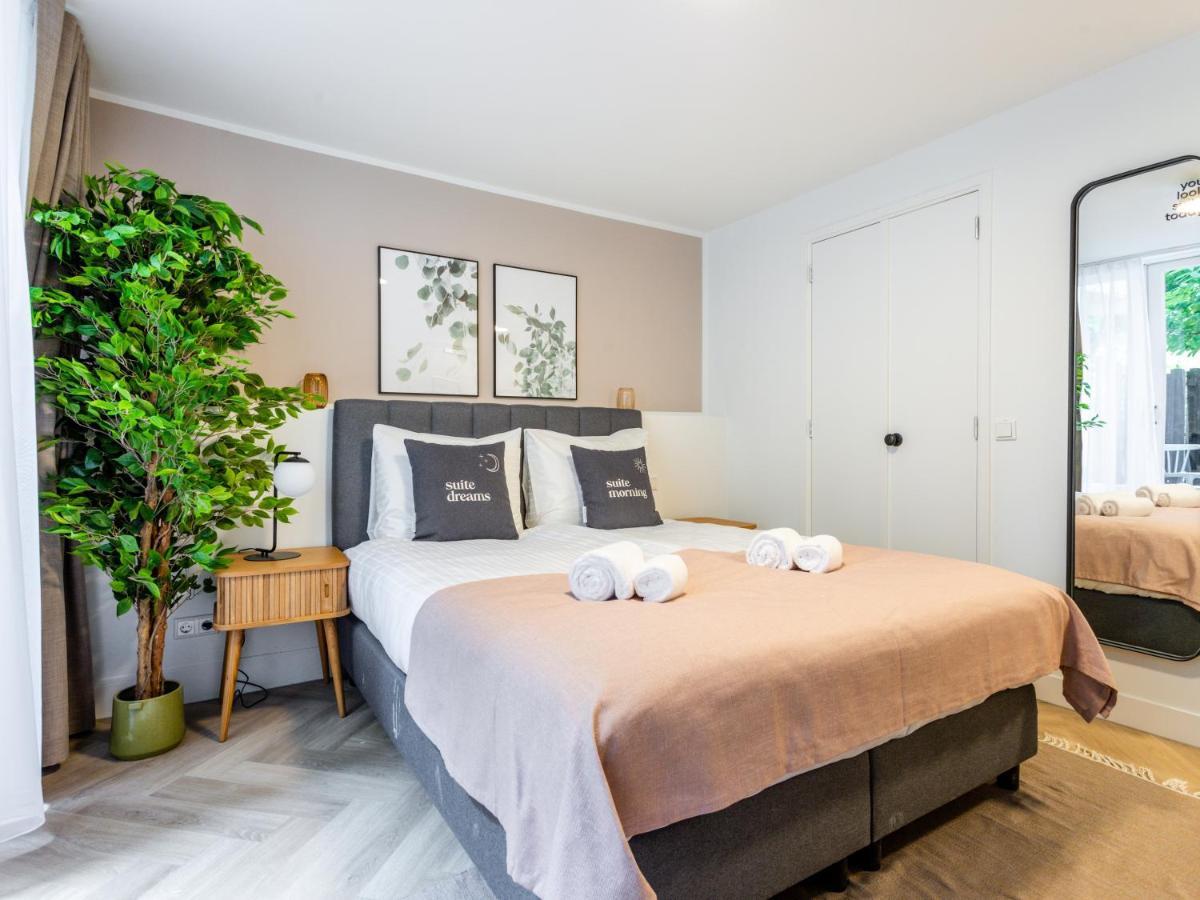 Kamer met Queensize Bed en Terras