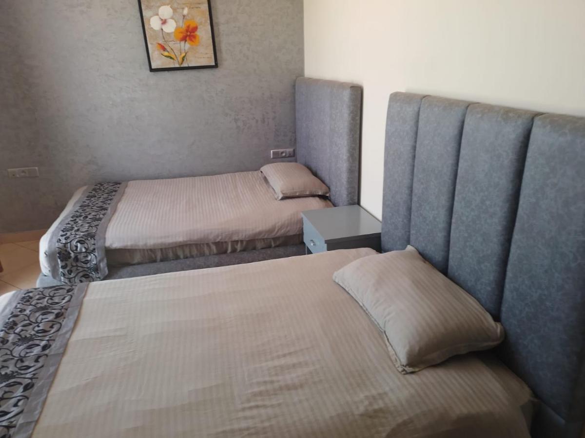 Tweepersoonskamer met 2 Aparte Bedden