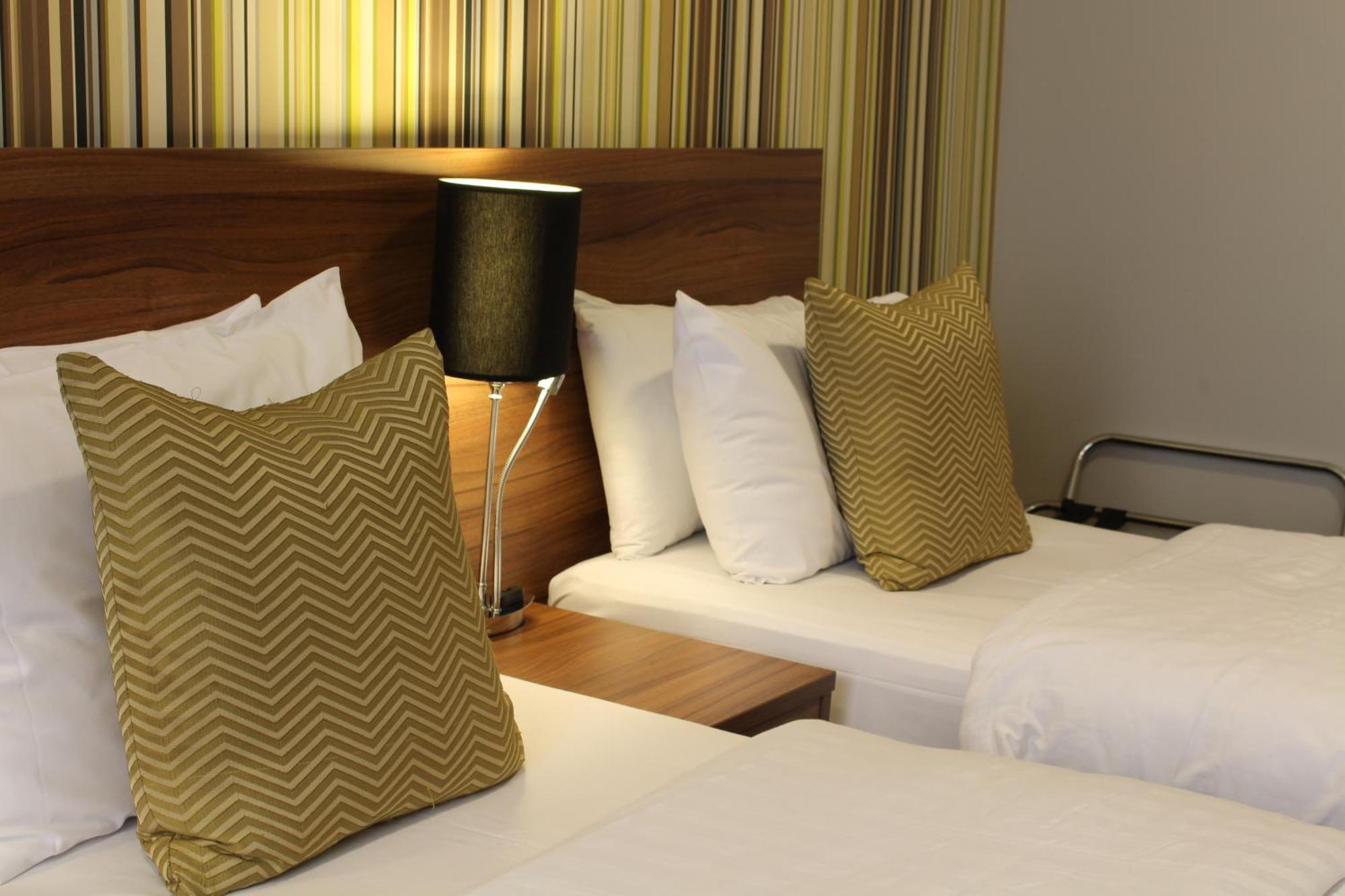 Tweepersoonskamer met 2 Aparte Bedden
