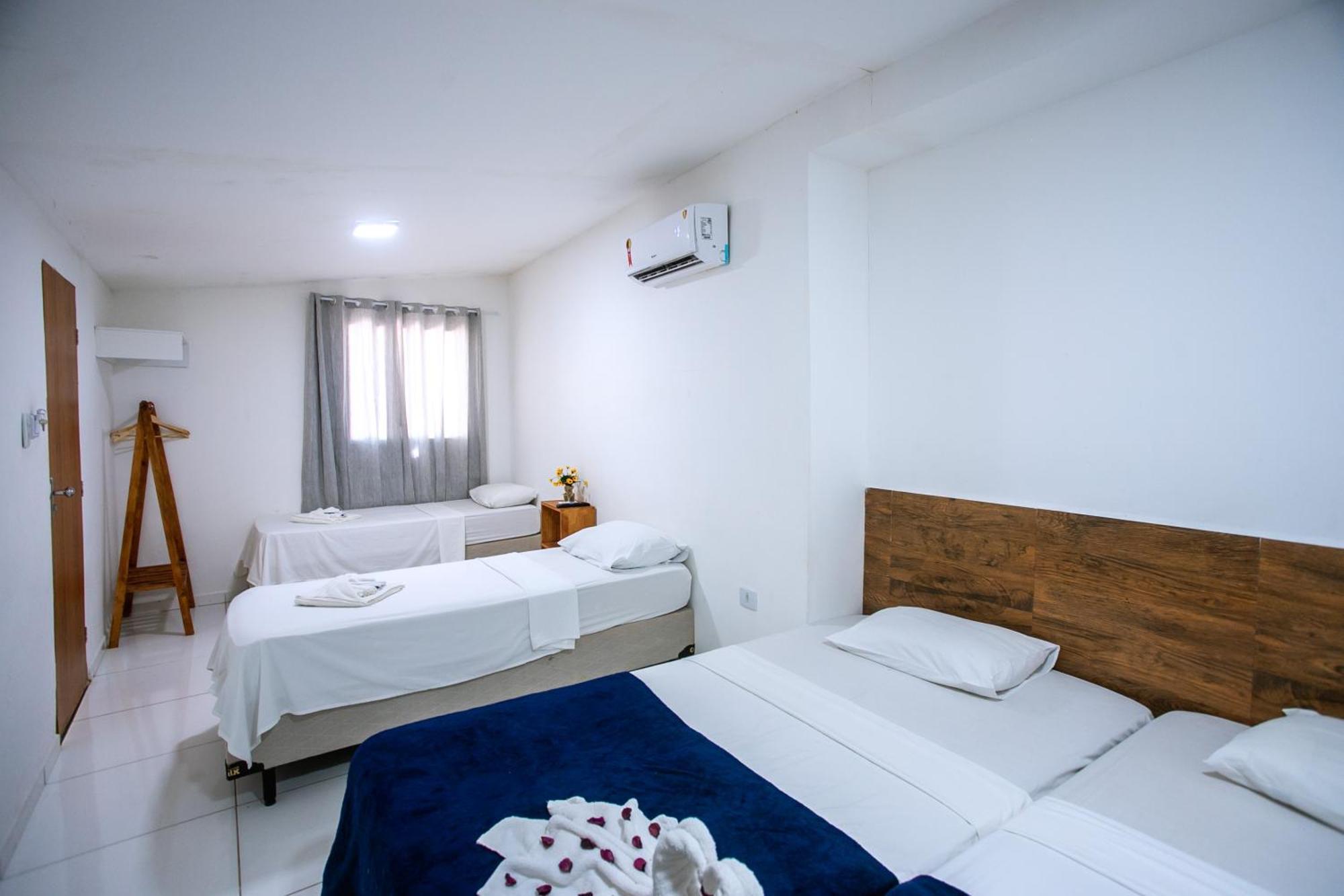 Quarto Quádruplo com Vista Jardim