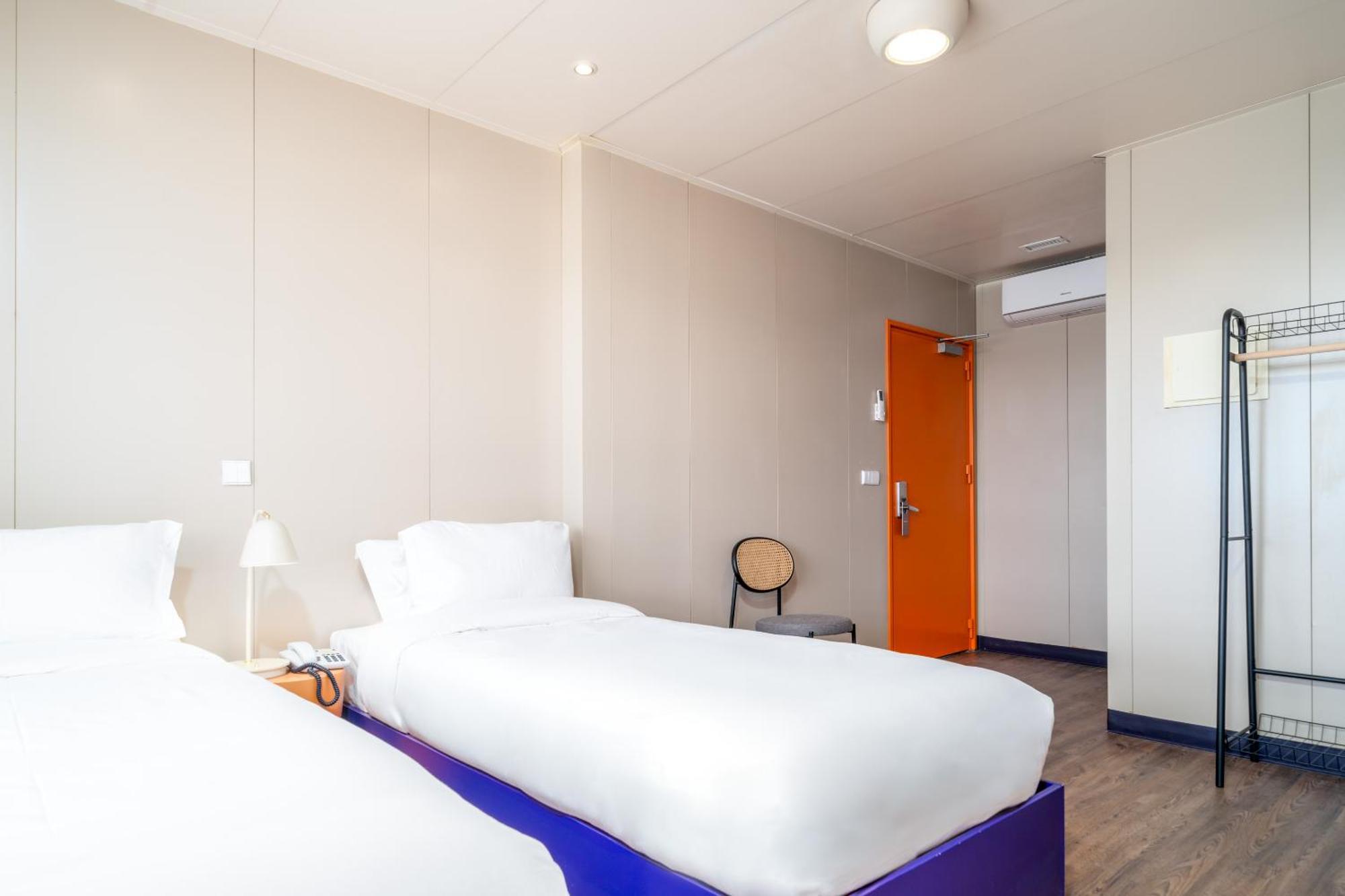 Tweepersoonskamer met 2 Aparte Bedden
