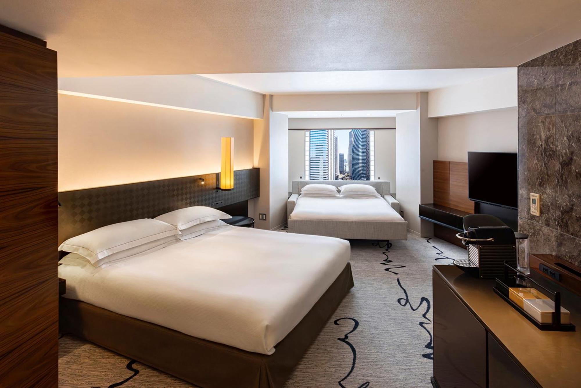 Quarto King Premium com Sofá-cama