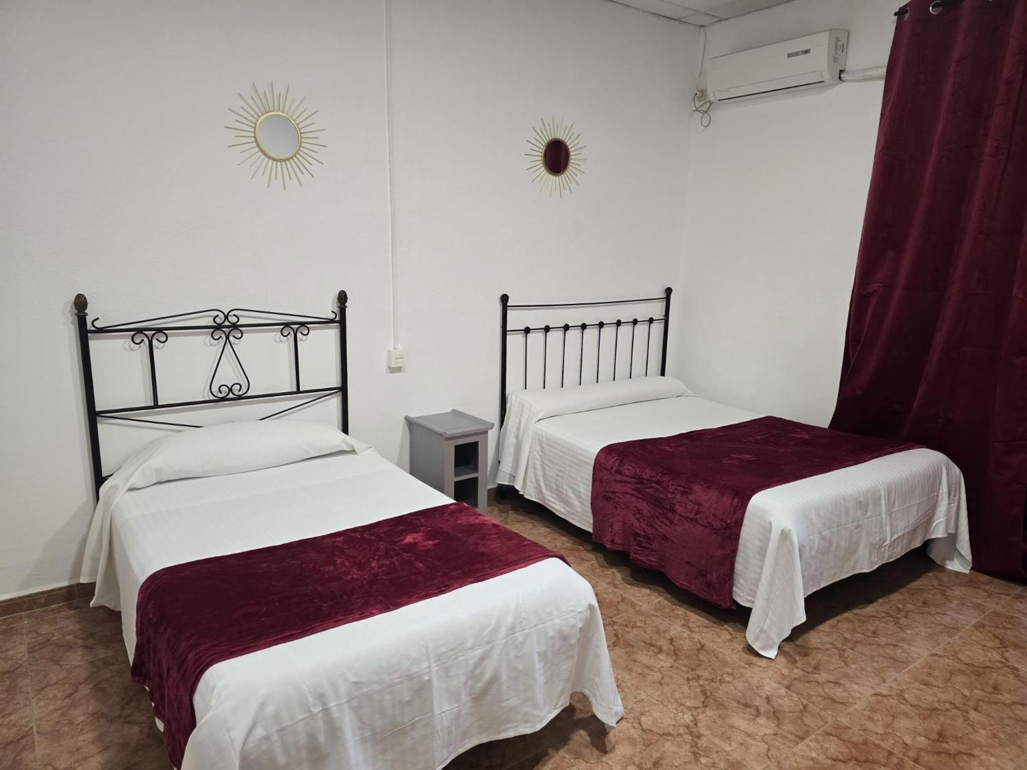 Dreibettzimmer mit Gemeinschaftsbad