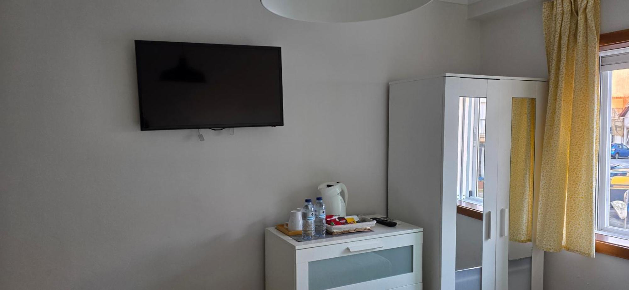 Habitación Triple con vistas al jardín