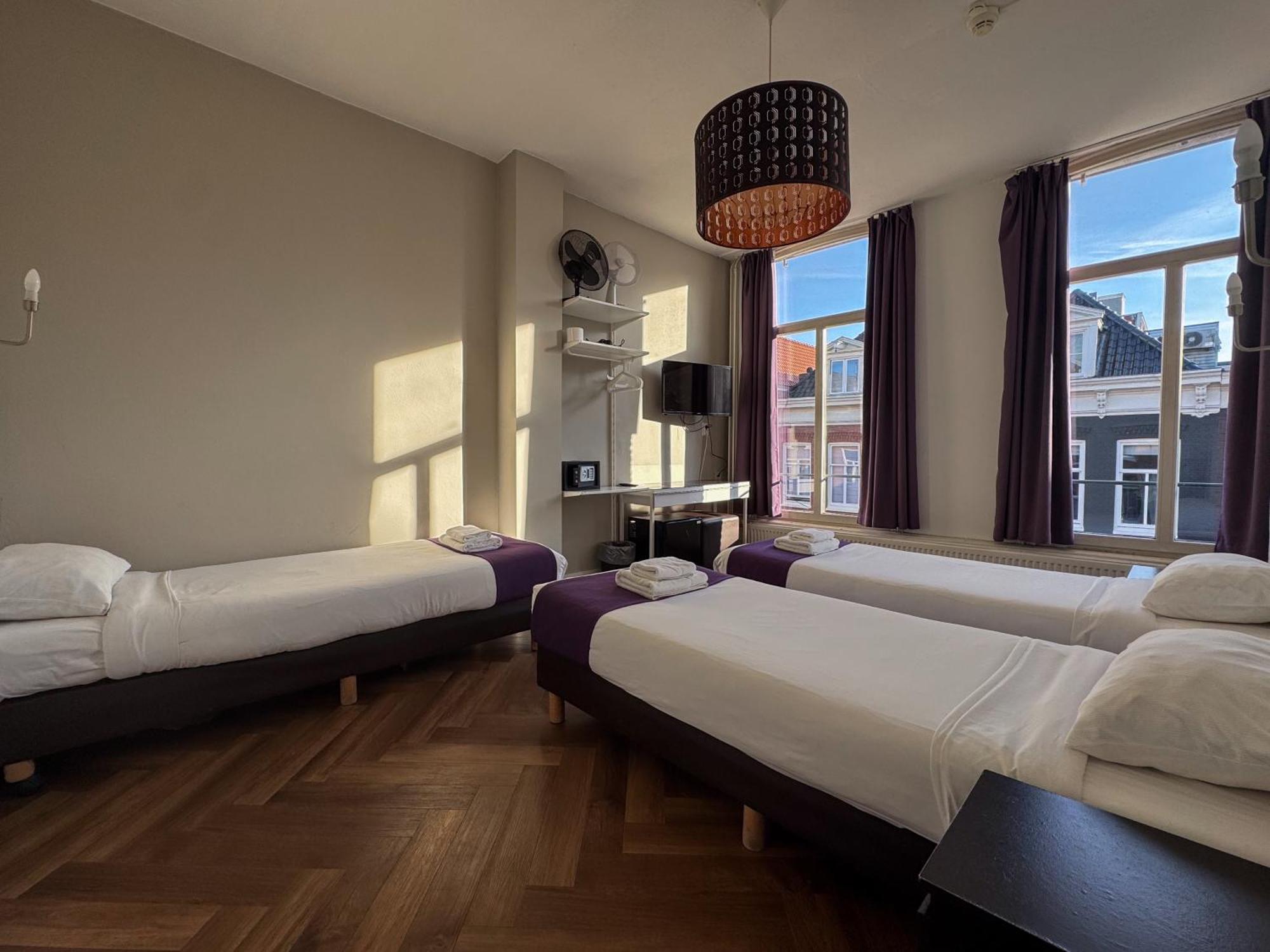 Habitación Triple Económica con baño compartido