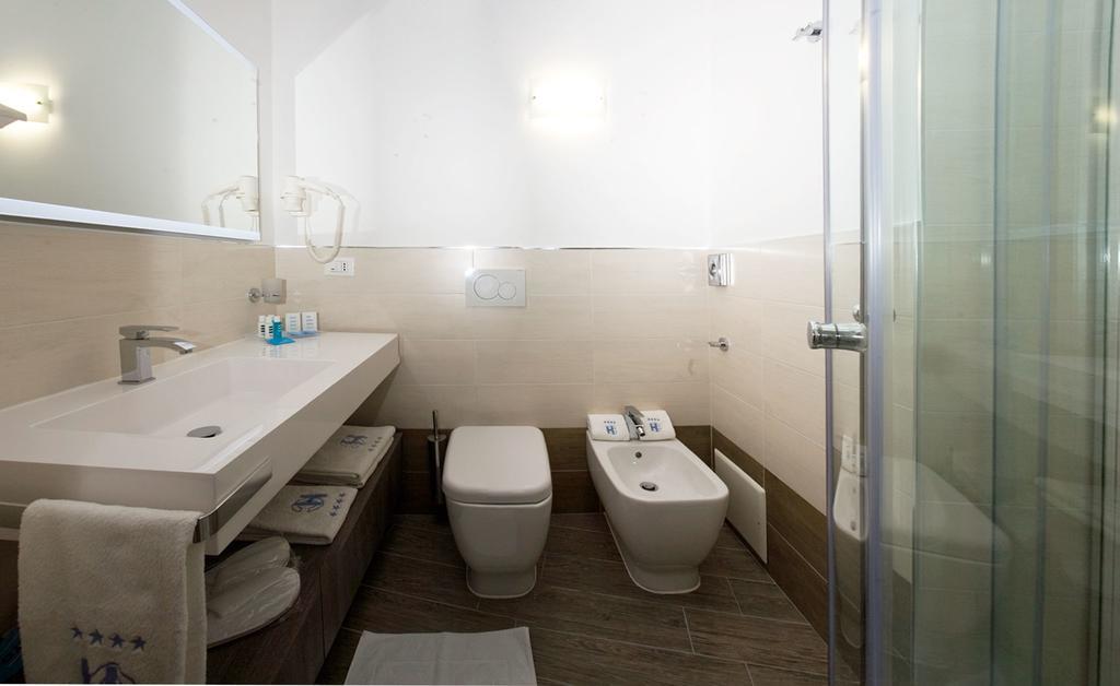 Double or Twin Room with Balcony and Lateral Sea View,560464692:JPEG